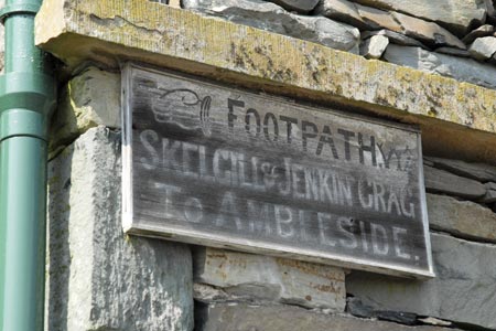 Old wooden footpath sign in Troutbeck