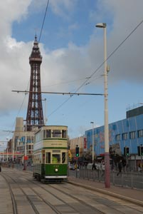 A tram passes Blackpool Tower