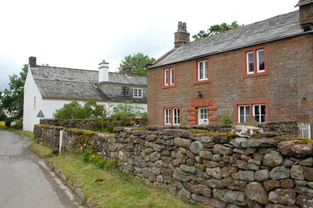 Cottages in Knock village built from local red sandstone