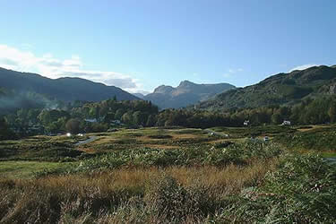 Langdale Pikes seen from the road over Elterwater Common
