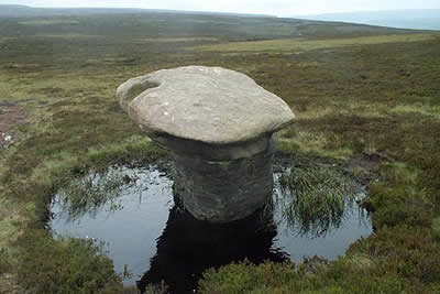 Howden Edge - a solitary rock sculpture with pool
