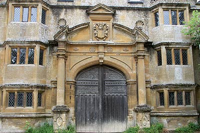 The beautiful stone gatehouse that leads to Stanway House