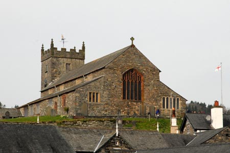 Hawkshead Church rises above the village rooftops