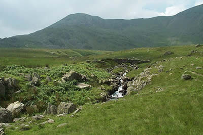 The Walna Scar Road climbs steadily to cross Torver Beck