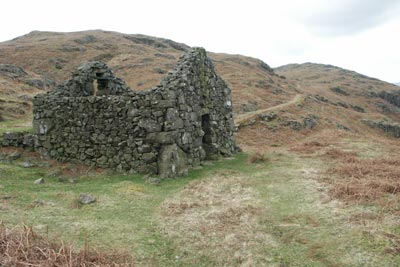 The ruined stone hut on the Peat Road to Low Birker Tarn