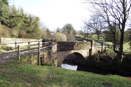 Spruisty 17th century packhorse bridge over Oak Beck