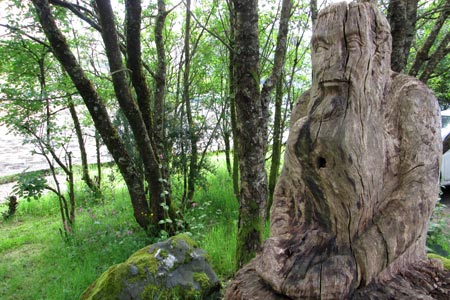 Wood carving at the car park by Loch Long
