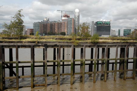 Thames Path - old wharves contrast with modern tower blocks