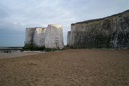 Pillars of chalk isolated from main cliff at Botany Bay