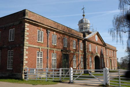 An imposing aspect of the stables and barns at Calke Abbey