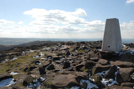 The trig point on the Roaches offers superb views
