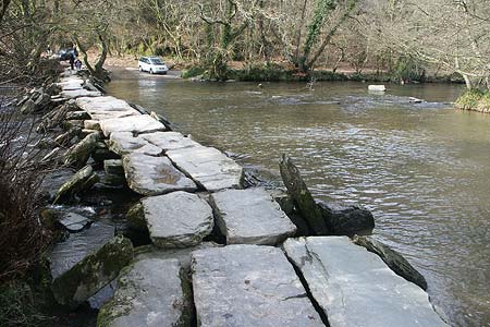 The Tarr Steps provide a dry crossing of the River Barle