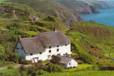 Thatched cottage above Church Cove, the Lizard