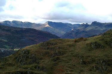 Loughrigg summit view includes Crinkle Crags