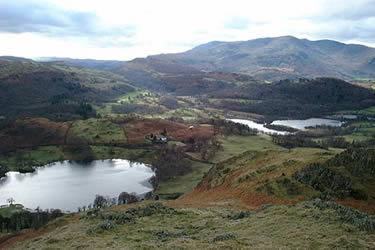 The view from Loughrigg over Loughrigg Tarn and Elterwater