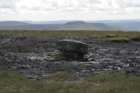 The summit of Waun Fach with the remains of the trig point