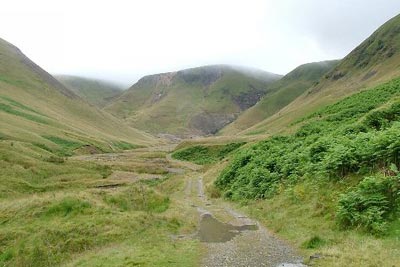Dale Beck with Iron Crag with its head in the clouds