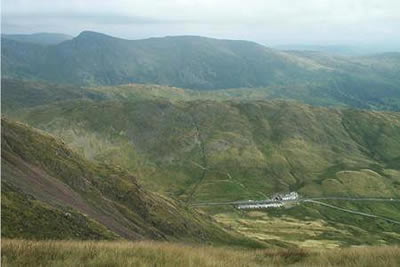 The Kirkstone Pass Inn is dwarfed by the surrounding fells