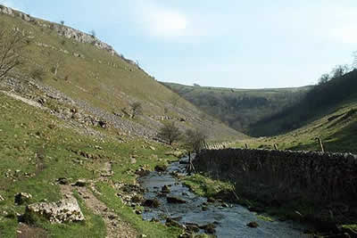 View east down Lathkill Dale to junction with Cales Dale