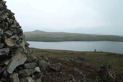 The summit of Glasgwm is marked by a beehive cairn