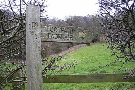 Footpath sign at Aumery Park