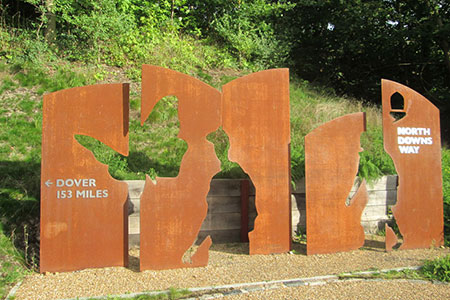 North Downs Way sign near Farnham railway station
