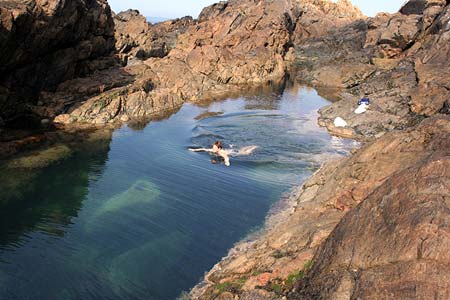 Swimming in deep water of Venus Pool, Lihou Island