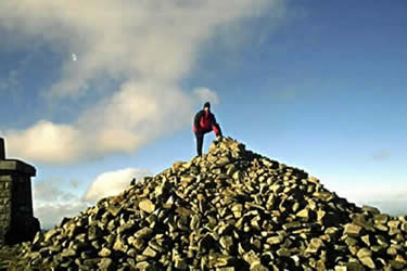 The summit of Slieve Donard with its oversized summit cairn